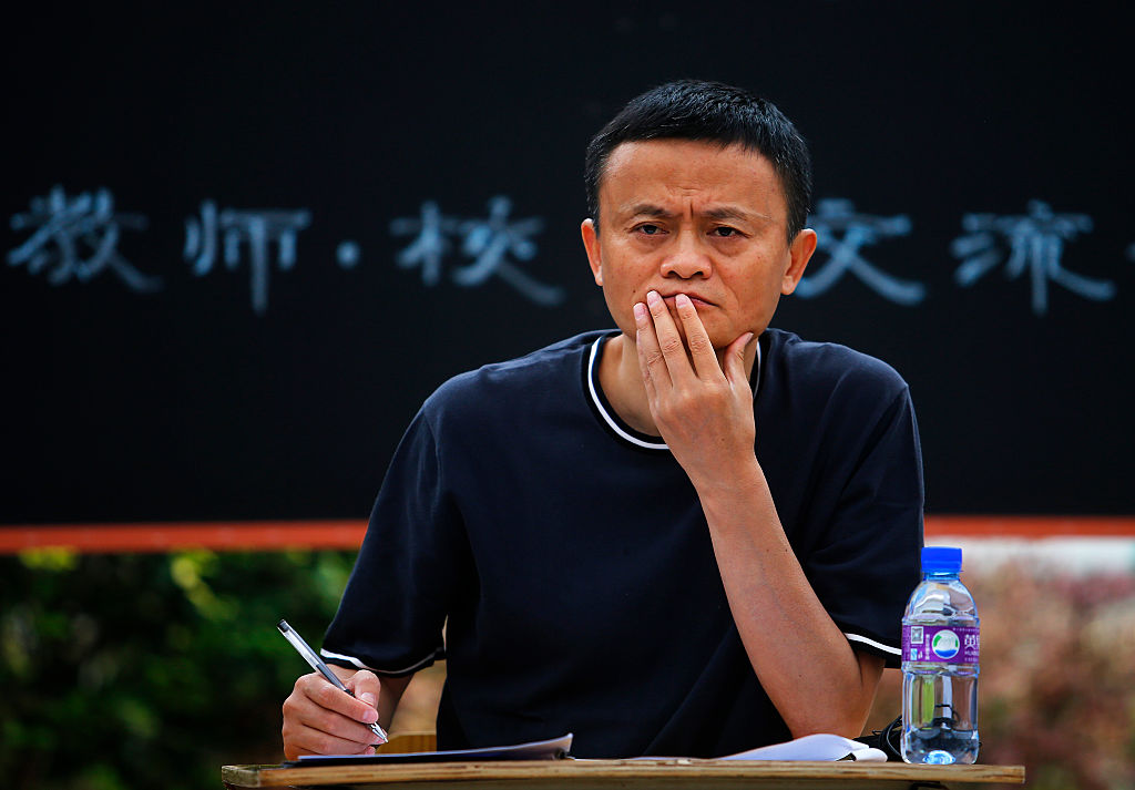 GUIYANG, CHINA - AUGUST 03: Jack Ma meets 40 rural teachers funded by him in the Xiaohewan Village Primary School on August 3, 2016 in Guiyang, China. A hundred rural teachers from six provinces in western China were awarded with the first batch of "Ma Yun Rural Teachers Prize" in 2015. These teachers all came from poverty-stricken areas and they each got a fund of about 100,000RMB. Jack Ma is expanding the scope for funding rural teachers to 12 provinces in China in 2016. (Photo by Wang He/Getty Images)