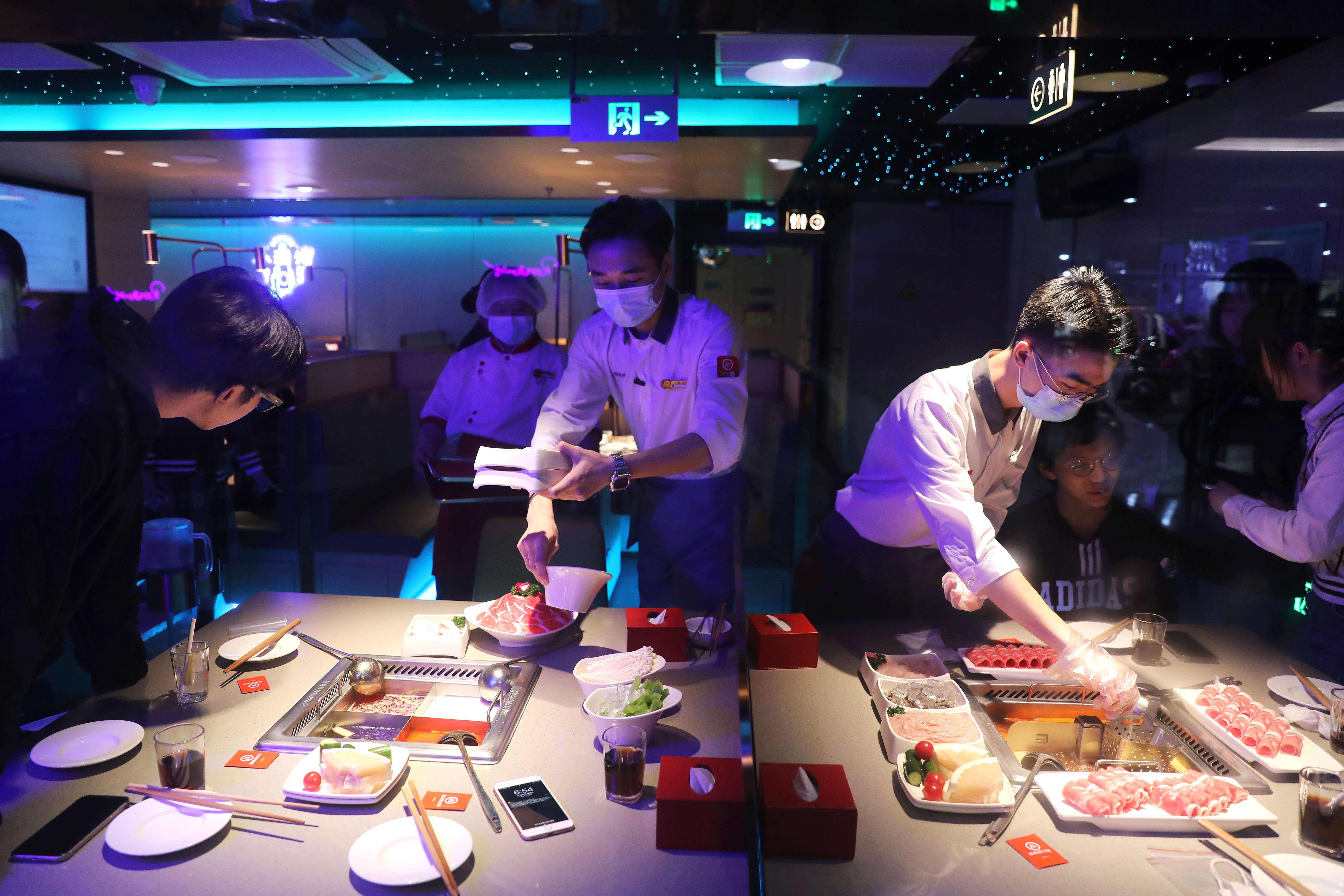 Restaurante em 
 Pequim  (Foto:Tingshu Wang/Reuters)