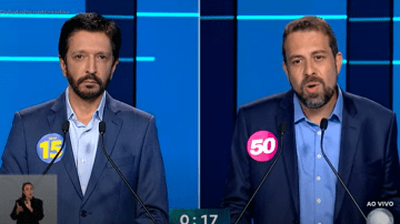 Ricardo Nunes e Guilherme Boulos no debate da Record/Estadão