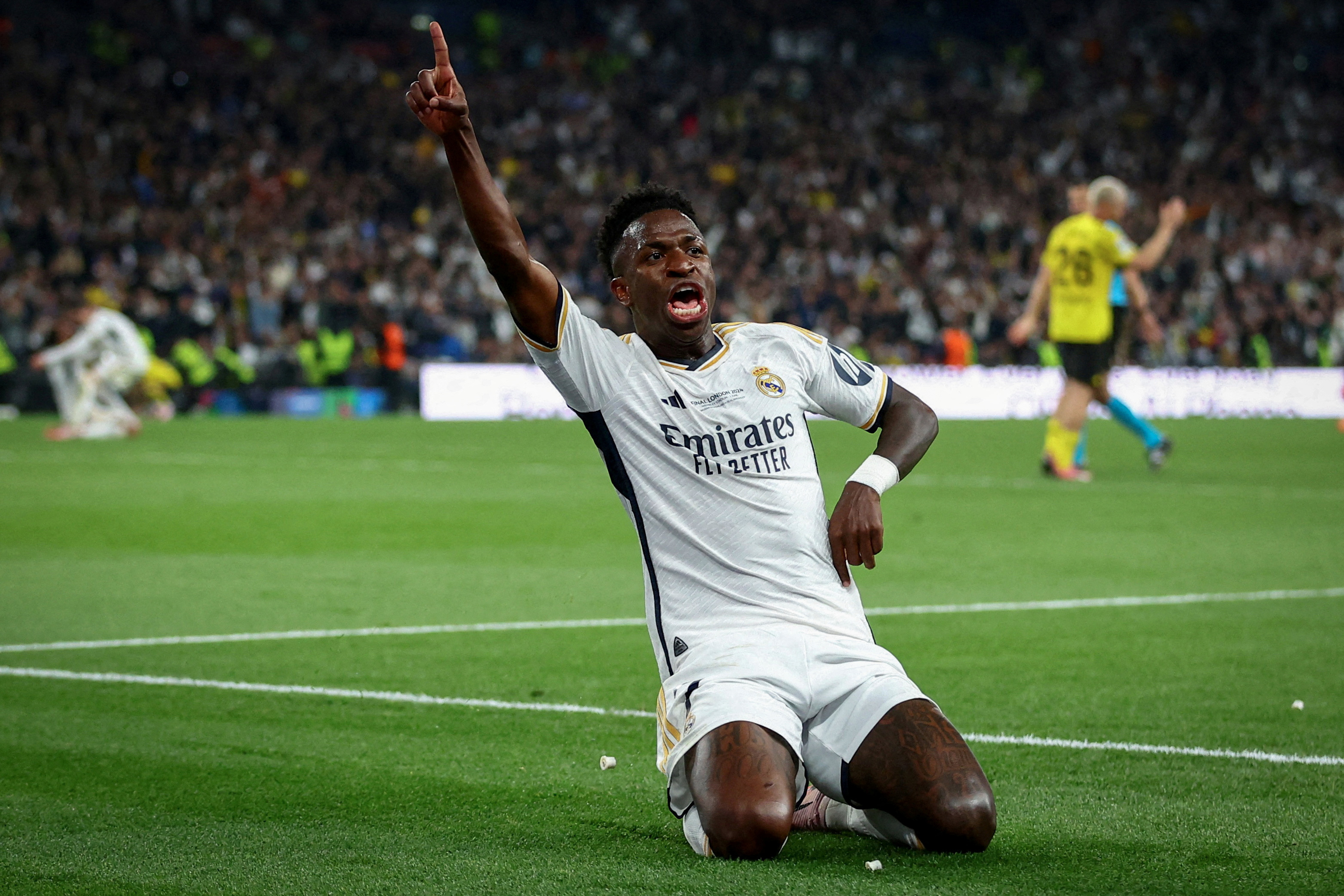 Vinicius Junior, do Real Madrid, celebra ao marcar o segundo gol na final da Champions League. REUTERS/Carl Recine
IMAGENS TPX DO DIA