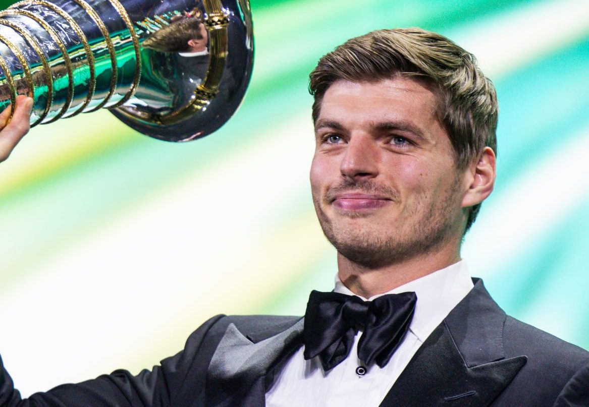 KIGALI, RWANDA - DECEMBER 13: In this handout provided by Federation Internationale de l'Automobile (FIA), F1 Champion Max Verstappen of Netherlands and Oracle Red Bull Racing receives the 1st position award during the FIA Awards 2024 on December 13, 2024 in Kigali, Rwanda. (Photo by Handout/FIA/DPPI via Getty Images )