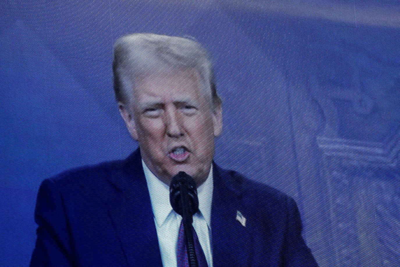 O presidente dos EUA, Donald Trump, faz um discurso especial remotamente durante a 55ª reunião anual do Fórum Econômico Mundial (WEF) em Davos, Suíça, em 23 de janeiro de 2025. REUTERS/Yves Herman/Foto de Arquivo